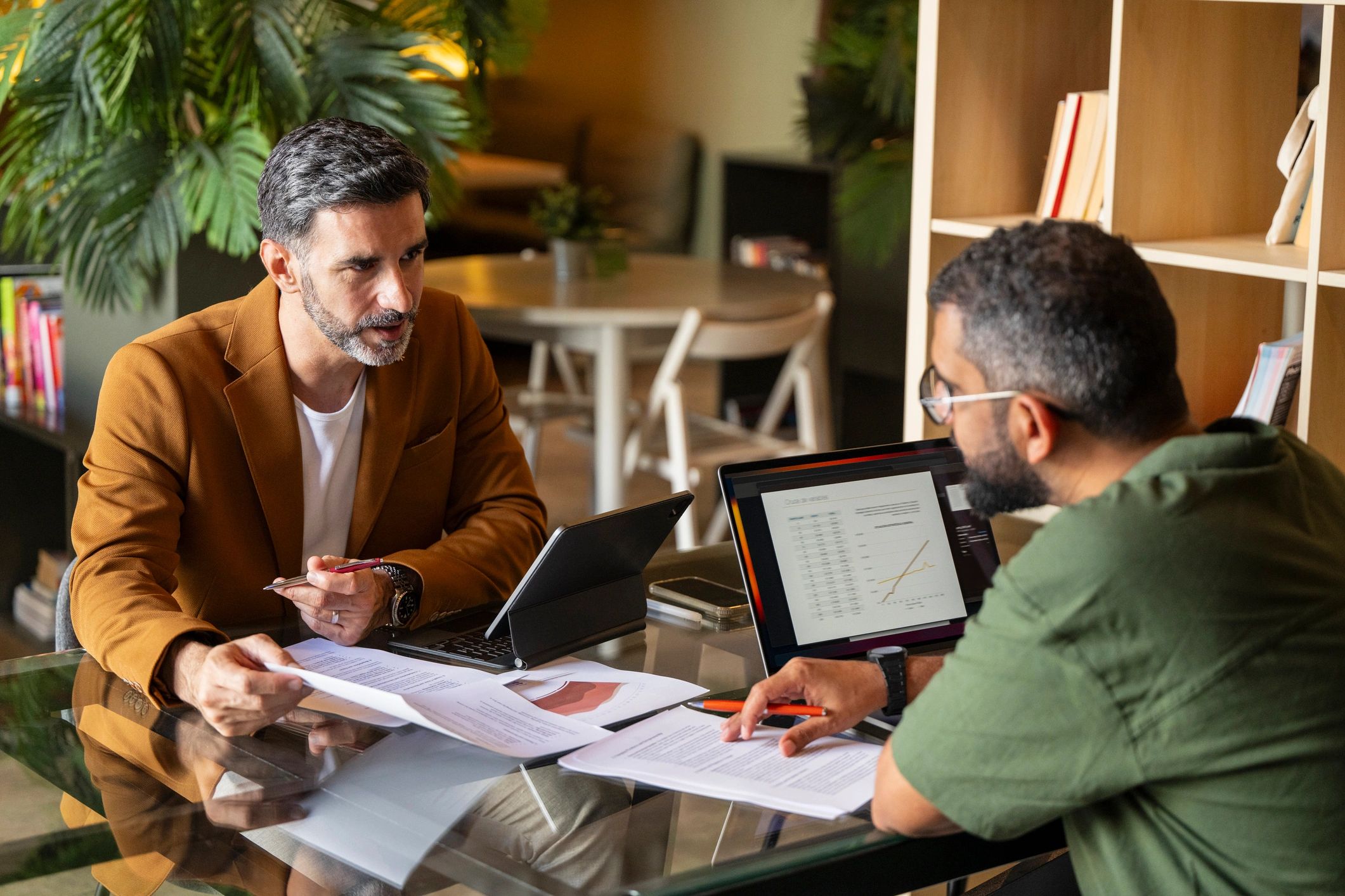 Financial advisor meeting with a client in a professional office