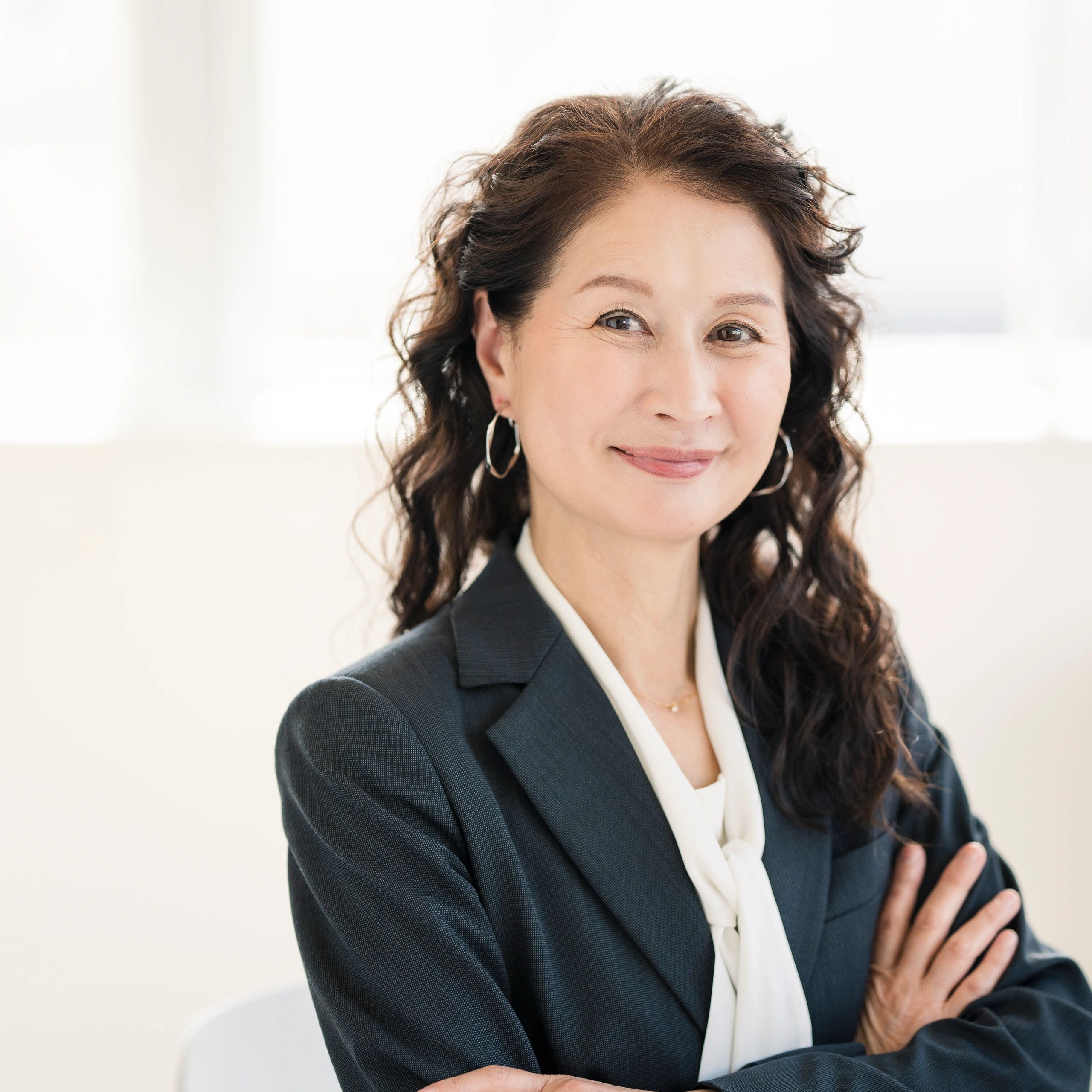 Professional headshot of a businesswoman in an office
